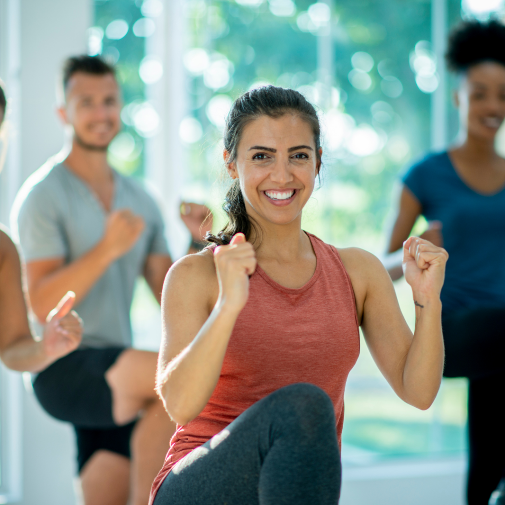 a group of people dancing in a dance studio