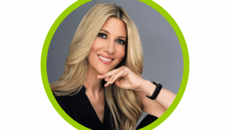 Amy-Salman headshot from the The-Wellness-Map with her hand on her chin smiling